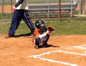 J geared up to play catcher for an inning.